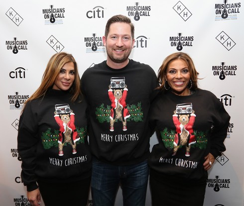 NEW YORK, NY - DECEMBER 08: (L-R) Siggy Flicker, President at Musicians On Call Pete Griffin, and Dolores Catania attend the Musicians On Call Deck The Halls Holiday Sweater Party at Kola House on December 8, 2016 in New York City. (Photo by Donald Bowers/Getty Images for Pepsi)