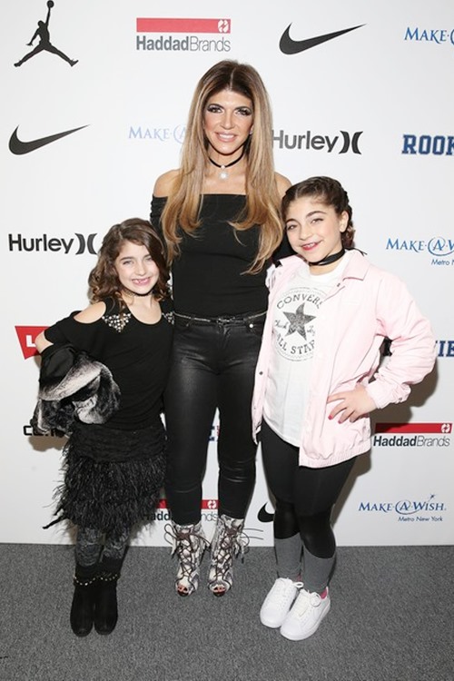 NEW YORK, NY - FEBRUARY 15: TV personality Teresa Giudice (C) attend the Rookie USA Fashion Show during New York Fashion Week: The Shows at Skylight Clarkson Sq on February 15, 2017 in New York City. (Photo by Bennett Raglin/Getty Images for Haddad)