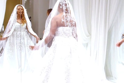 Eva Marcille tries on wedding gowns