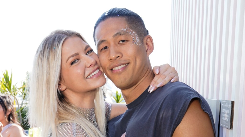 Ariana Madix and Daniel Wai smiling cheek to cheek