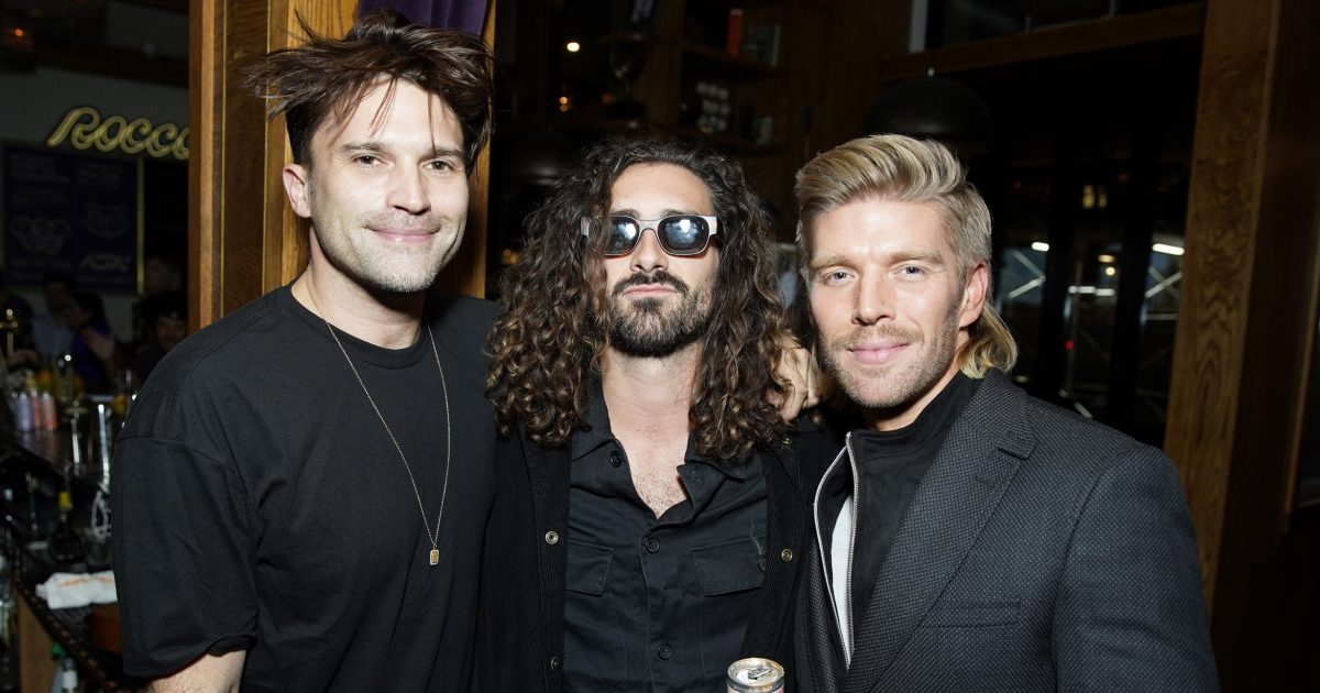 Tom Schwartz, Alex Propson, and Kyle Cook dressed in all black and smiling.
