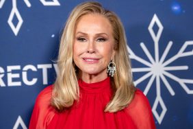 Kathy Hilton posing in a red dress, standing in front of a blue backdrop with snowflakes