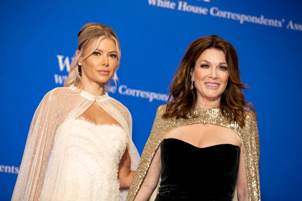 Ariana Madix in a white gown standing with Lisa Vanderpump in a black and gold gown at the White House Correspondents Dinner