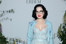 Dita Von Teese in a light blue lace outfit.