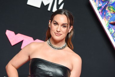Hannah Berner posing in a black dress at the 2023 MTV VMA's.