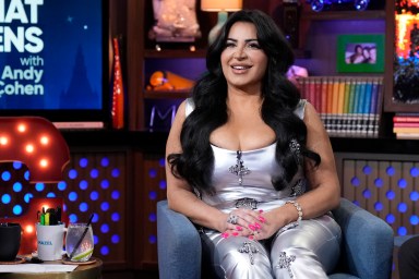 Mercedes "MJ" Javid on Watch What Happens Live; she's smiling and wearing a silver jumpsuit