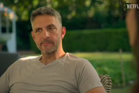 Mauricio Umansky sitting outside in a grey t-shirt with a serious look on his face in Buying Beverly Hills Season 2