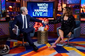 Porsha Williams and Andy Cohen on Watch What Happens Live, holding hands and smiling at each other