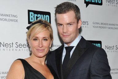 Ryan Serhant and Sonja Morgan smiling together and wearing black
