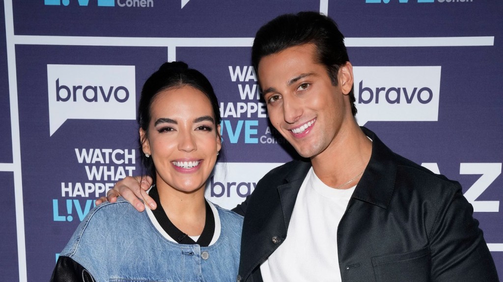 Danielle Olivera and Joe Bradley posing together backstage at Watch What Happens Live