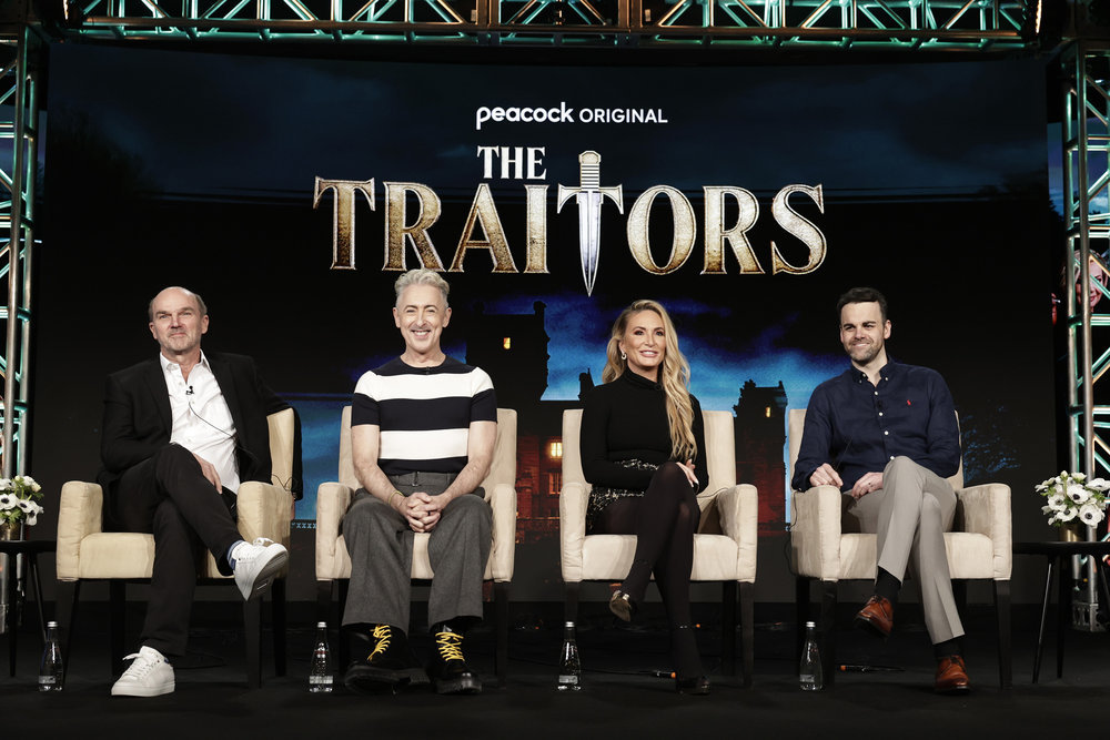 The Traitors producers, alongside host Alan Cumming and contestant Kate Chastain