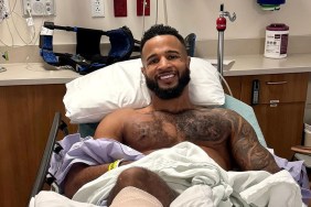 Nelson Thomas laying in a hospital bed with no shirt on