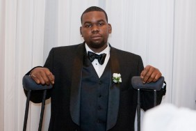 Bryson Bryant in a black tuxedo, smiling, and propping himself up on a set of crutches