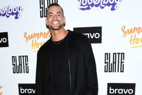 Jesse Solomon posing in an all-black outfit while smiling