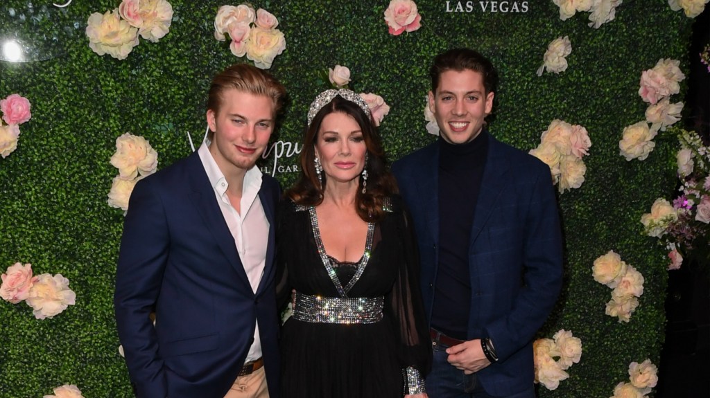 Lisa Vanderpump, Sam Vanderpump, and Jack Vanderpump posing at Vanderpump Gardens