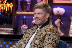 Kyle Cooke in a gold patterned jacket on Watch What Happens Live