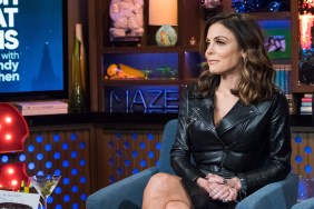 Bethenny Frankel sitting with her legs crossed in a black dress during an episode of Watch What Happens Live