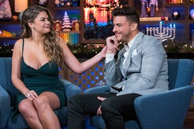 Brittany Cartwright and Jax Taylor on Watch What Happens Live; Brittany has her hand on Jax's shoulder