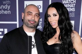 John Fuda and Rachel Fuda wearing black and posing together backstage at Watch What Happens Live