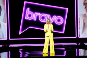 Ariana Madix in a yellow suit standing in front of a purple Bravo logo at the NBC Upfronts 2023