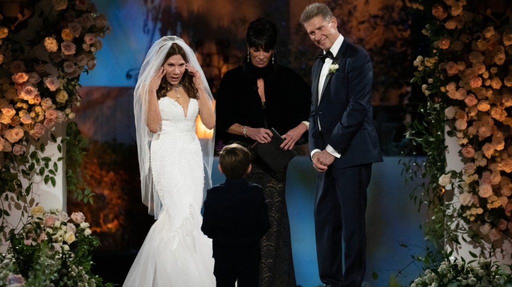 Theresa Nist and Gerry Turner standing at the wedding alter on the Golden Bachelor