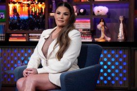 Brittany Cartwright sitting on Watch What Happens Live and wearing a white blazer