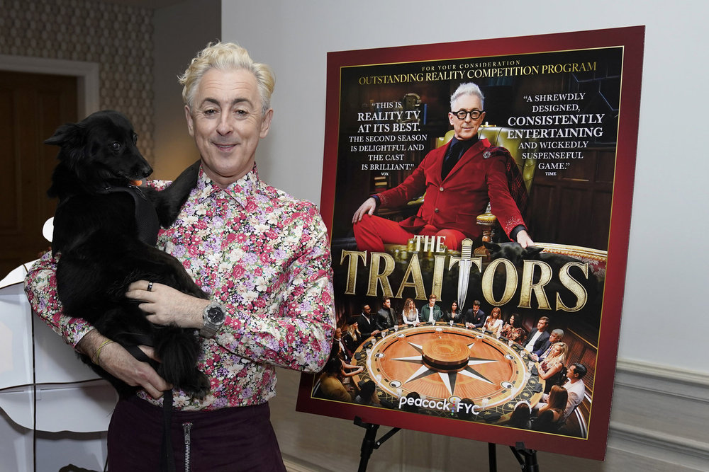 Popular host of The Traitors, Alan Cumming, with his dog Lala.