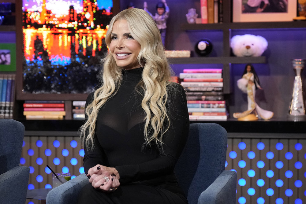 RHOM's Alexia Nepola wearing a black dress on WWHL.