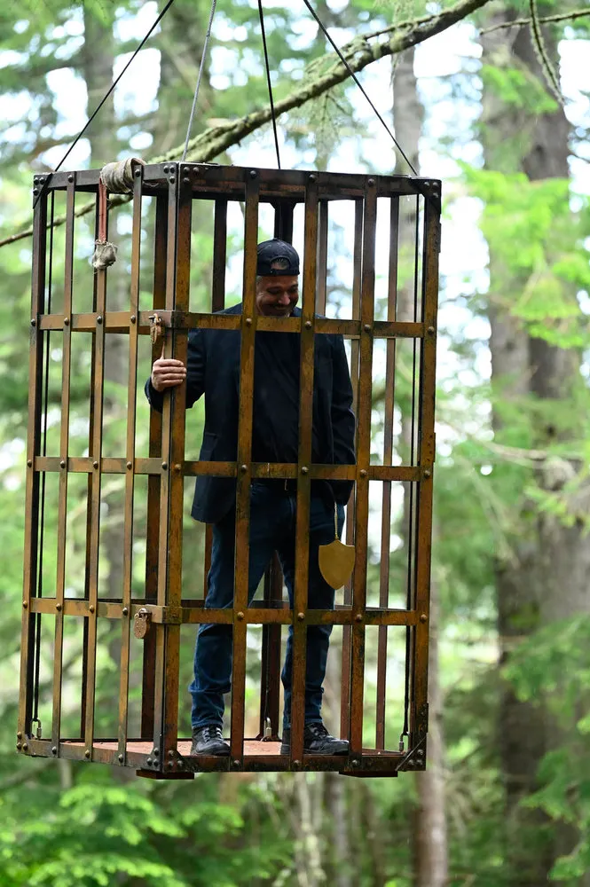 Boston Rob Mariano in a cage on The Traitors Season 3