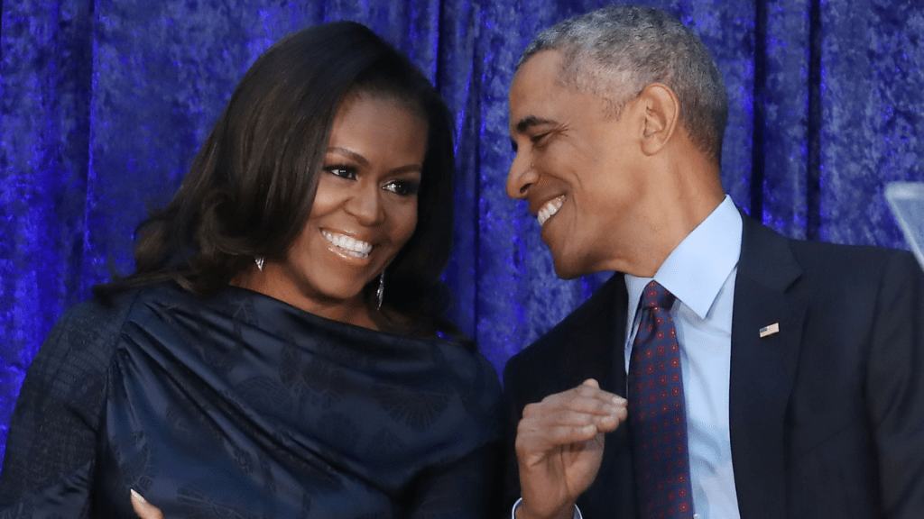 Former U.S. President Barack Obama and first lady Michelle Obama participate in the unveiling of their official portraits during a ceremony at the Smithsonian's National Portrait Gallery, on February 12, 2018 in Washington, DC.