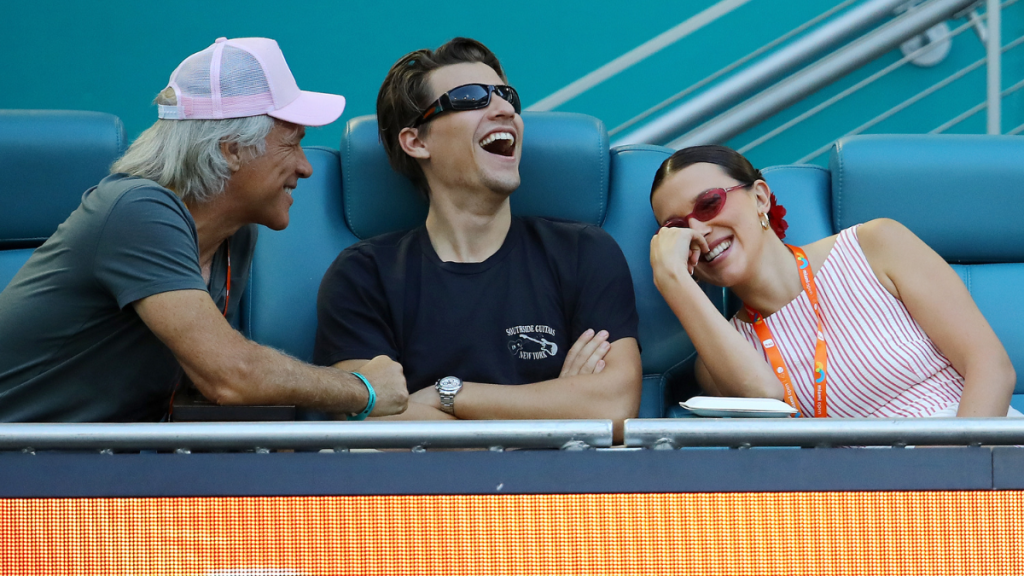 Jon Bon Jovi, Jake Bongiovi and Millie Bobby Brown attend the Novak Djokovic of Serbia and Sebastian Korda of the United States match on Day 10 of the Miami Open at Hard Rock Stadium on March 27, 2025 in Miami Gardens, Florida.