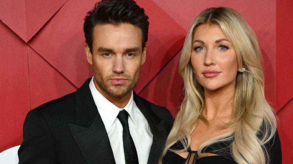 English singer Liam Payne and US actor Katie Cassidy pose on the red carpet upon arrival at The 2022 Fashion Awards in London on December 5, 2022.
