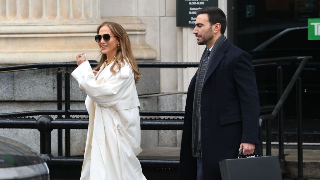 Jennifer Lopez and Brett Goldstein are seen filming on the "Office Romance" movie set on April 07, 2025 in Hoboken, New Jersey.