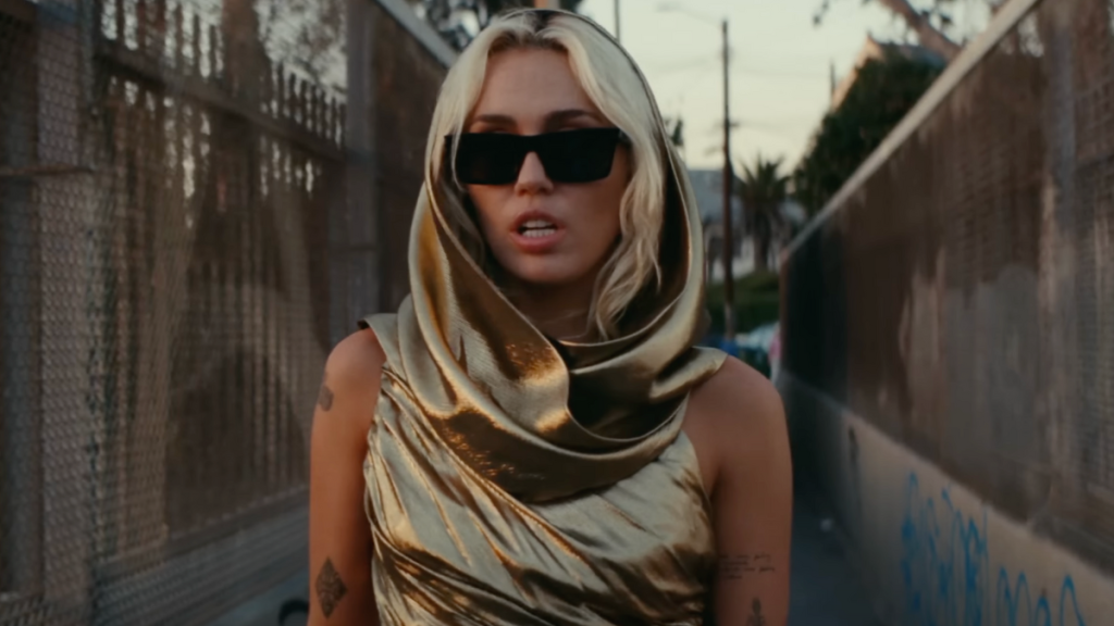 Miley Cyrus Jennifer Lawrence Flowers golden dress outfit