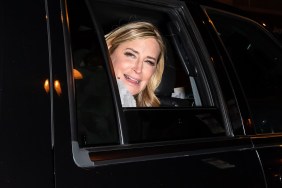 Sonja Morgan sticking her head out the window of a car