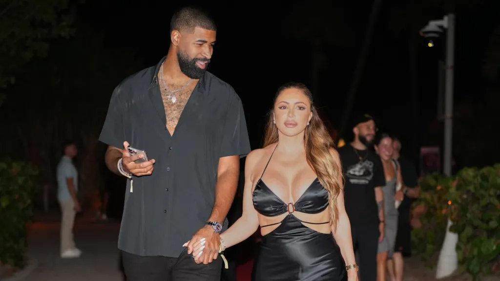 Jeff Coby and Larsa Pippen walking hand in hand