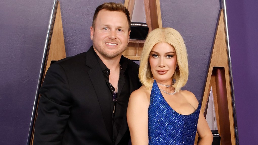 Heidi Montag and her wig posing with Spencer Pratt at the AMAs 2025
