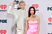 Machine Gun Kelly, winner of the Alternative Rock Album of the Year award for 'Tickets To My Downfall,’ and Megan Fox attend the 2021 iHeartRadio Music Awards at The Dolby Theatre in Los Angeles, California, which was broadcast live on FOX on May 27, 2021.