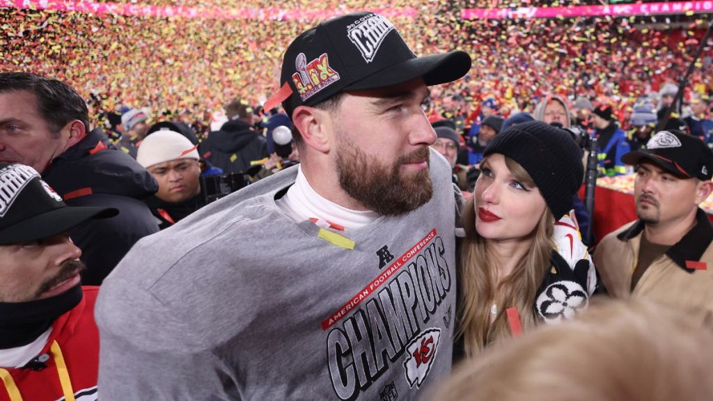 Taylor Swift celebrates with Travis Kelce #87 of the Kansas City Chiefs after defeating the Buffalo Bills 32-29 in the AFC Championship Game at GEHA Field at Arrowhead Stadium on January 26, 2025 in Kansas City, Missouri.