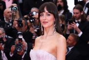 Dakota Johnson attends the "Highest 2 Lowest" red carpet at the 78th annual Cannes Film Festival at Palais des Festivals on May 19, 2025 in Cannes, France.