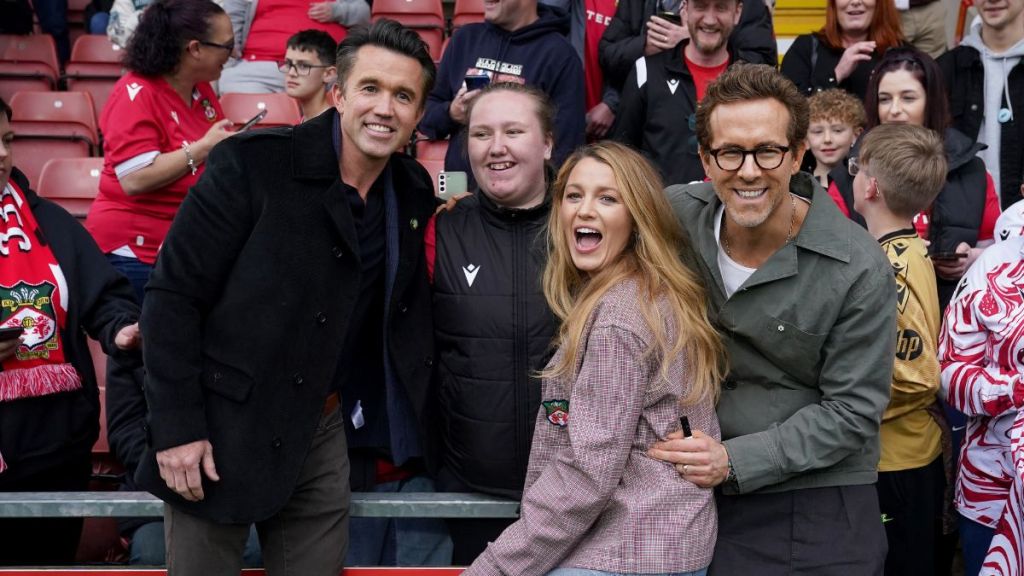 Wrexham co-owners Rob McElhenney (left) and Ryan Reynolds (right) and Ryan's wife Blake Lively before the Sky Bet League One match at SToK Racecourse, Wrexham.