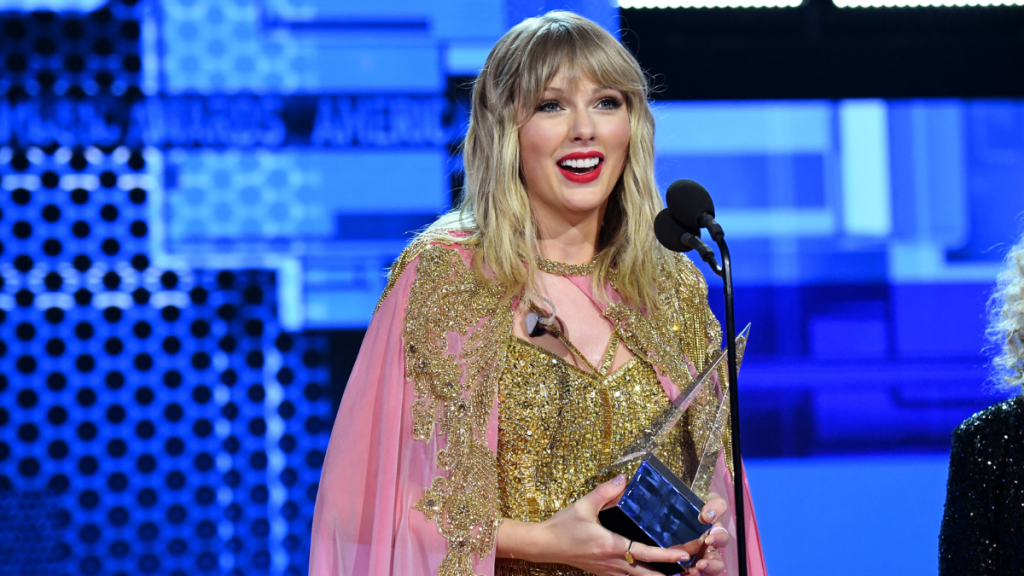 Taylor Swift accepts the Artist of the Decade award onstage during the 2019 American Music Awards at Microsoft Theater on November 24, 2019 in Los Angeles, California.
