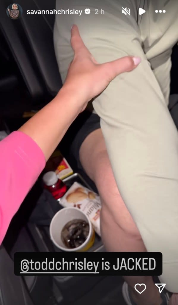 Savannah Chrisley squeezing her dad's arm