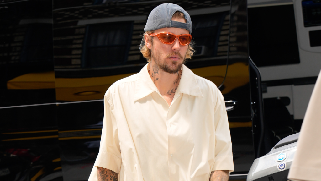 Justin Bieber standing on business paparazzi video Instagram