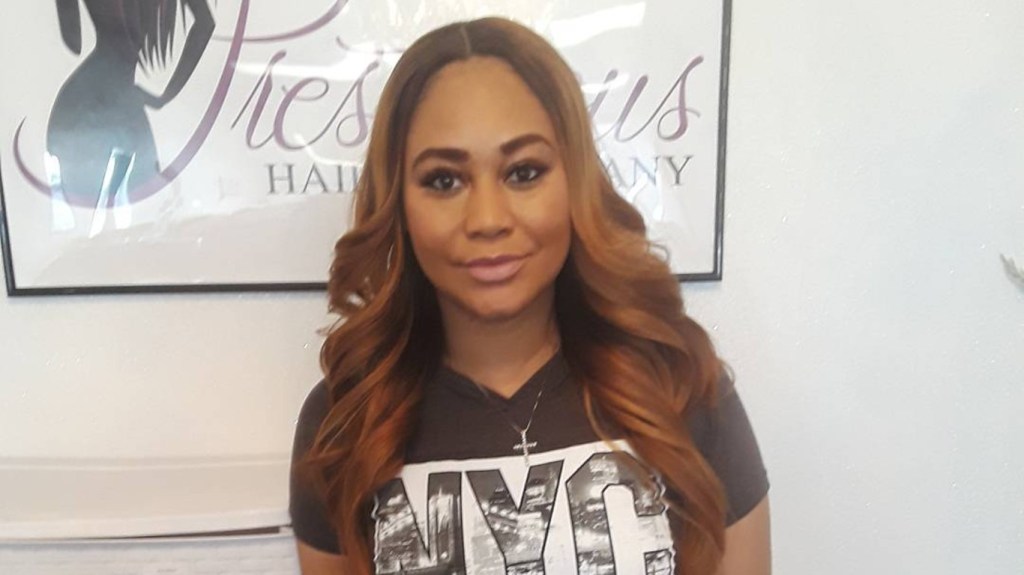 Khadiyah Lewis wearing a black shirt that says NYC