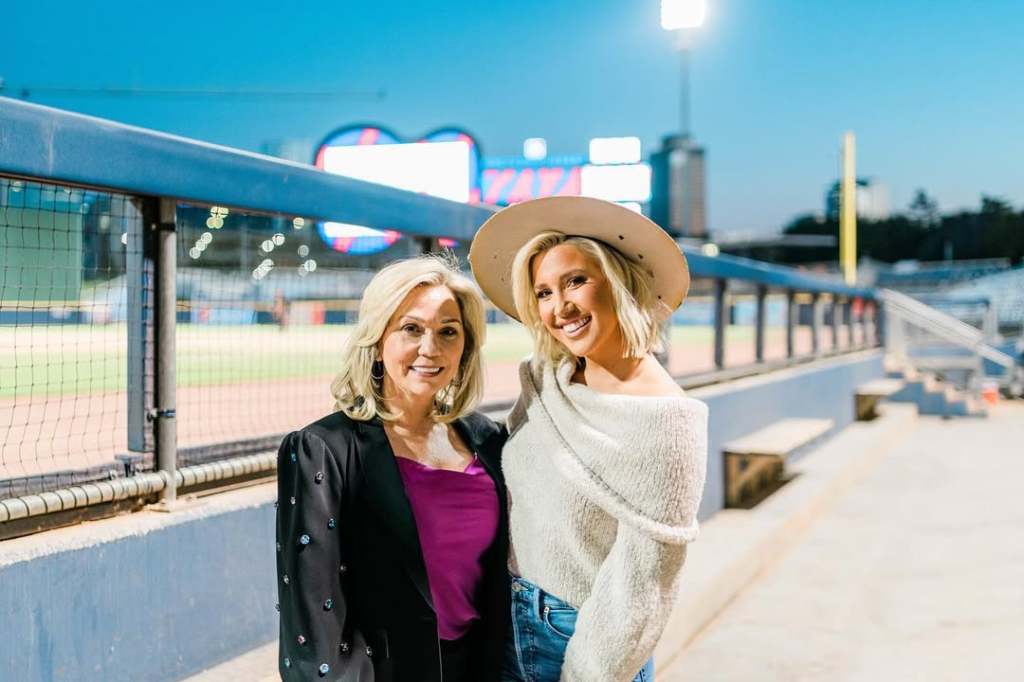 Julie Chrisley and Savannah Chrisley at a baseball game