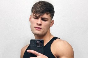 Dylan Geick taking a selfie and wearing a black tank top