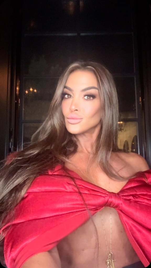 A selfie of Elizabeth McGraw in a red top 