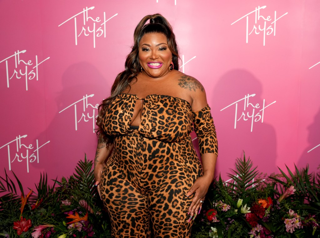 Ts Madison in a leopard print jumpsuit at the opening of The Tryst