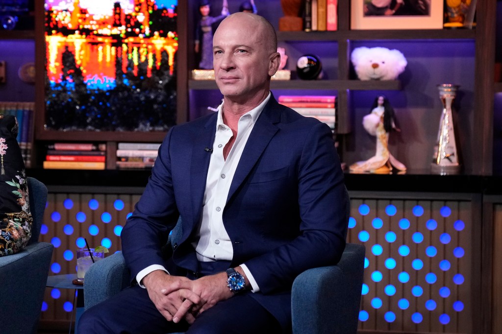 Captain Kerry Titheradge in a navy blue suit on Watch What Happens Live